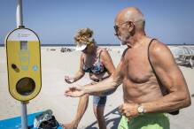 Niederlande installieren kostenlose Sonnencreme-Spender
