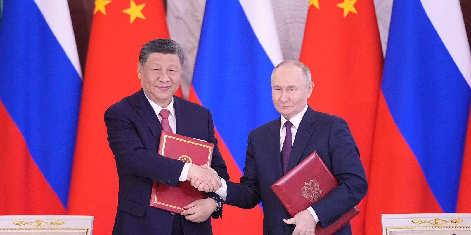 Putin und Xi bekräftigen Partnerschaft. Putin und Xi bekräftigen Partnerschaft.
